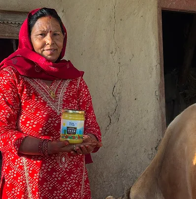 Himkul woman holding Himritva product